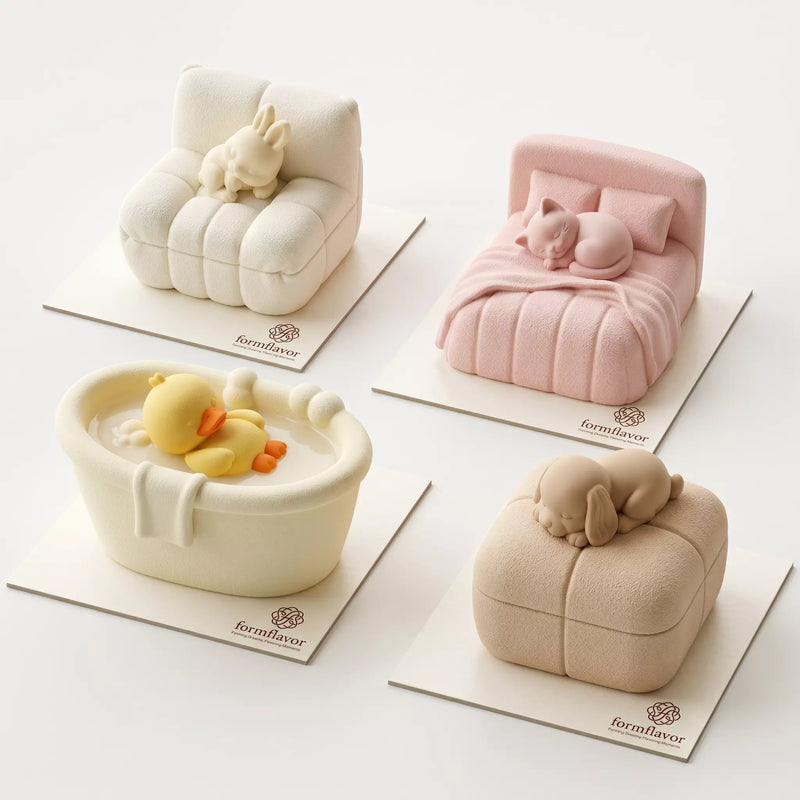 Finished Cozy Companions mini mousse cakes featuring bunny sofa, kitten bed, duckling bathtub, and puppy ottoman designs.