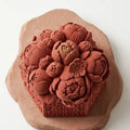 Macro shot of the high-definition peony petals on a professional mousse cake.