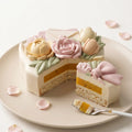 Cutaway view of the Love Letter floral bouquet mousse cake, showing the layered mousse, cake insert, and sponge structure inside.