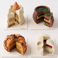 Cutaway view of Midnight Curiosities Halloween mousse cakes showing layered mousse, inserts, sponge and crunchy bases.