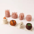 Halloween 3D silicone molds displayed with their finished candle, pumpkin, skull and poison jar mousse cakes.