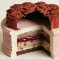 Cross-section of the Rose Heartfelt mousse cake showing the heart-inspired internal structure.