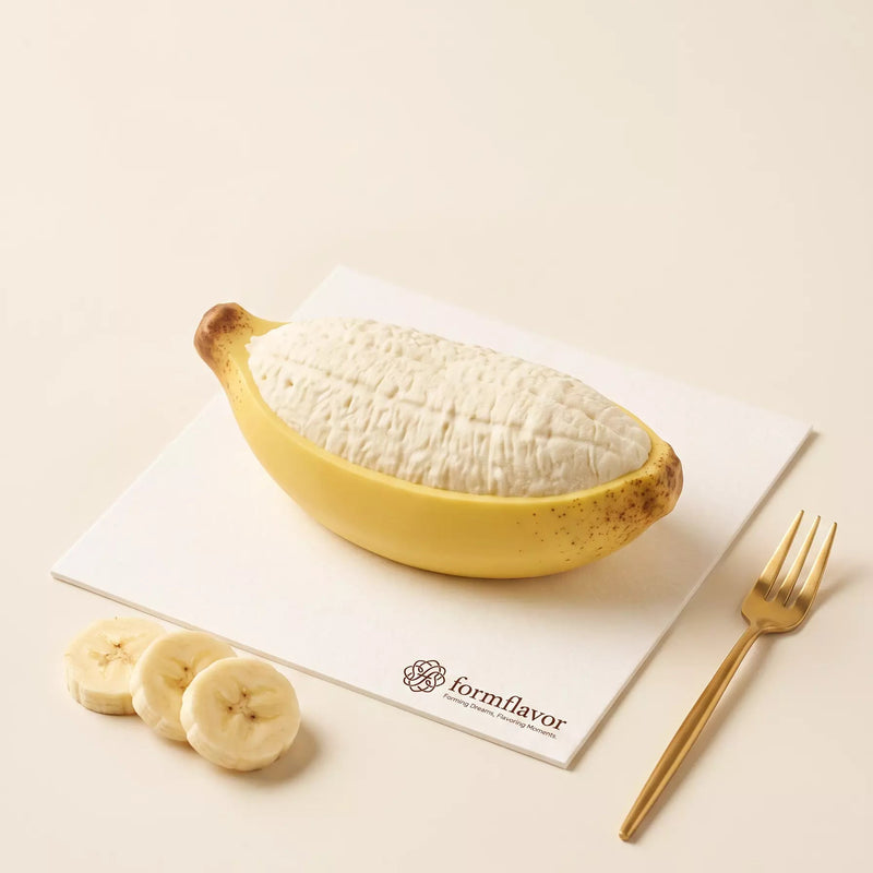 cake.webpSunny Banana realistic 3D banana-shaped mousse cake made with the silicone mold set
