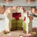 Cross-section of the tulip bouquet cake showing professional mousse and fruit insert layers.