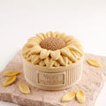 Finished sunflower mousse cake made with the “You Are My Sunshine” 3D silicone cake mold.